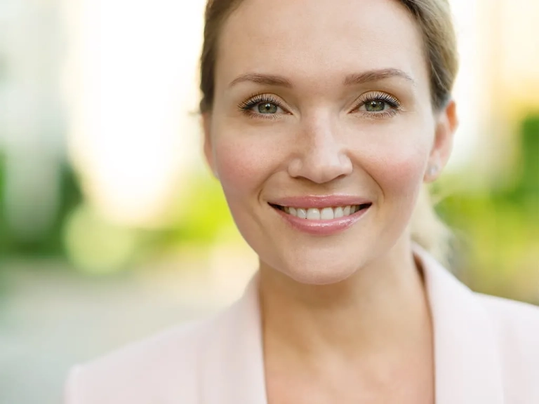Close up of a woman on the street looking at the camera for Skinvive at The Hughes Center in Cherry ill NJ