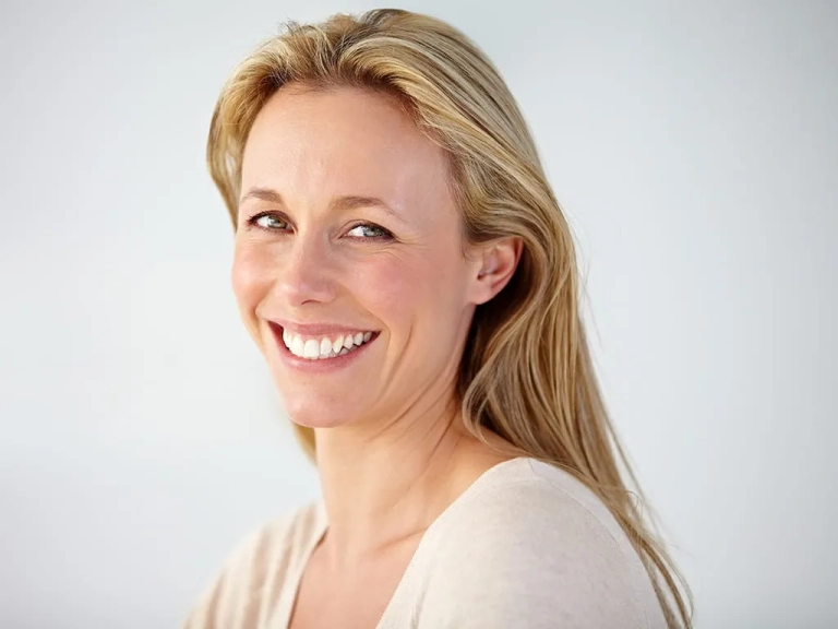 Photo of a woman looking at the camera for Botox treatment at The Hughes Center in Cherry Hill NJ
